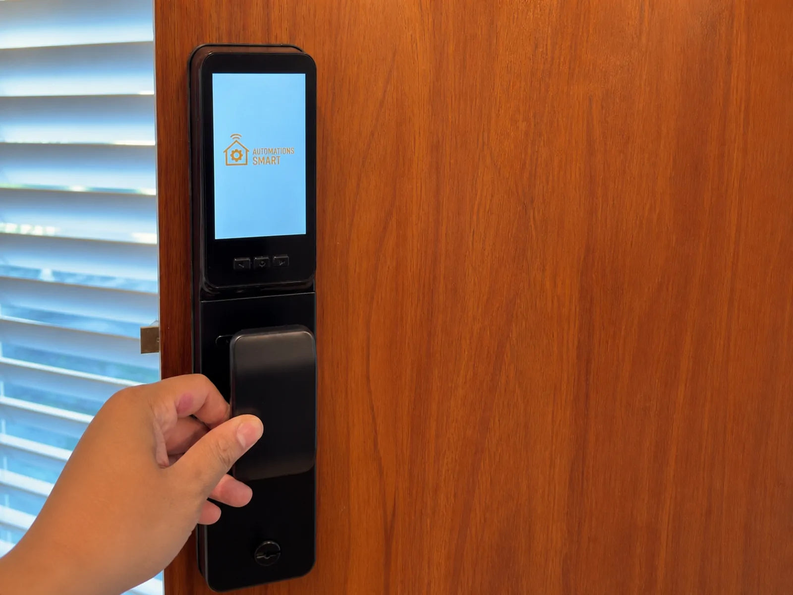 S2 smart lock fitted to a timber entrance with a security door